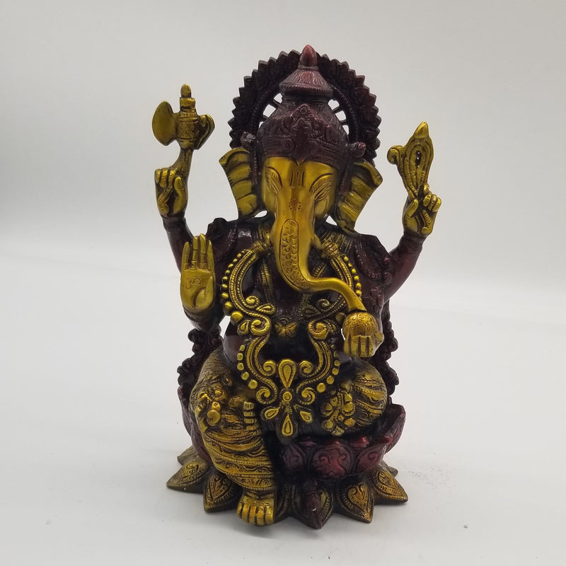 Brass Ganesh sitting on lotus