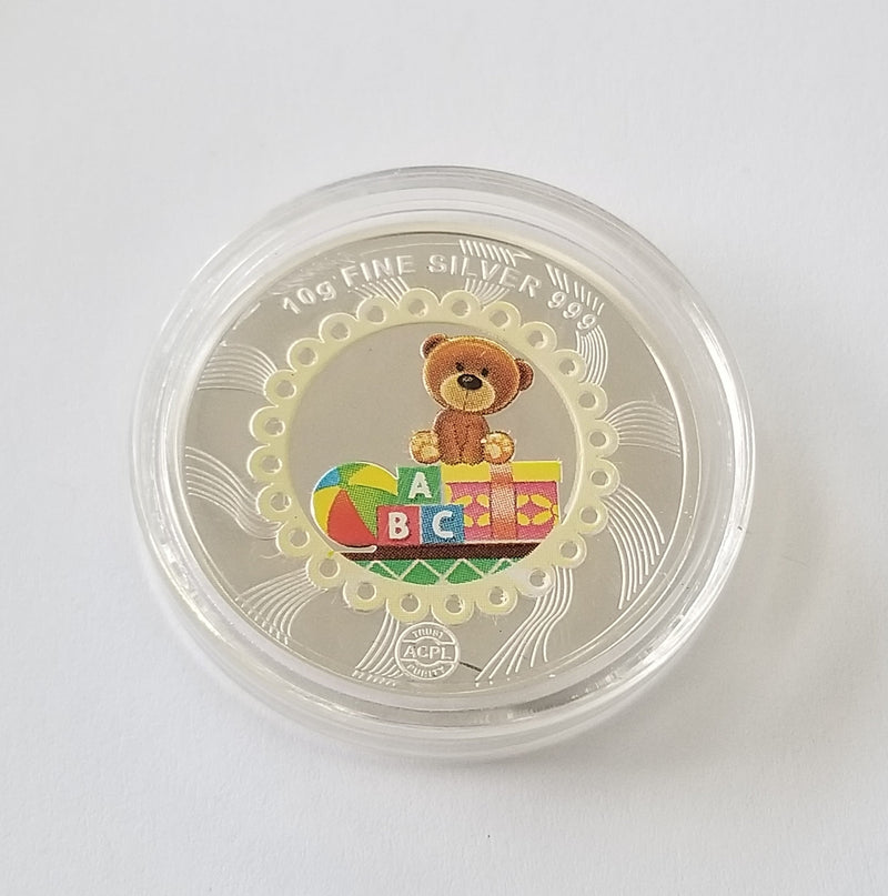 999 Silver Coin - 10 Grams Assorted Embossed/Enameled
