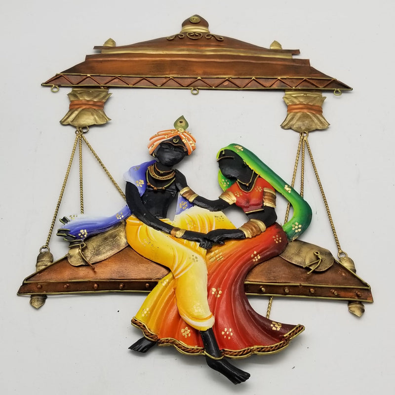 28" H Wrought Iron Radhakrishna resting on home swing